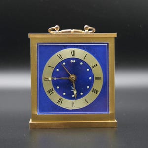 Vintage alarm clock signed Jaz Belvic 1975 to 1978. Alarm clock, pendulum. Vintage clock, mechanical clock, mechanical alarm clock.
