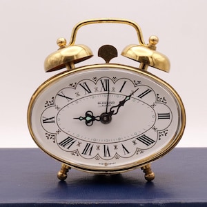 Nice little alarm clock from the Blessing brand, Alarm clock, vintage clock, mini collectible clock, antique clock, clock.
