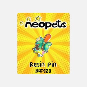 May include: A yellow and orange resin pin featuring a cartoon ice cream cone with a blue bow and sprinkles. The pin has the text "Neopets" and "Resin Pin Nat420" on it.