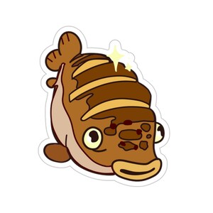 May include: A cartoon illustration of a brown fish with a shiny, golden star on top of its head. The fish has a wide, open mouth and large, round eyes.