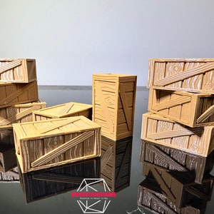 Peut inclure: Un ensemble de six caisses en bois, certaines empil&eacute;es les unes sur les autres. Les caisses sont de couleur brun clair et ont une texture en bois. Les caisses sont toutes de tailles et de formes diff&eacute;rentes.