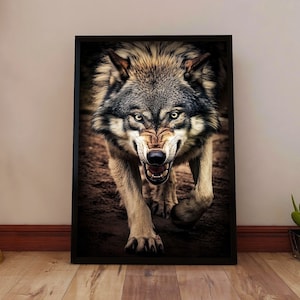 May include: A framed print of a wolf with a fierce expression, looking directly at the viewer. The wolf is gray and brown with a black nose and sharp teeth. The background is a blurry brown and green.