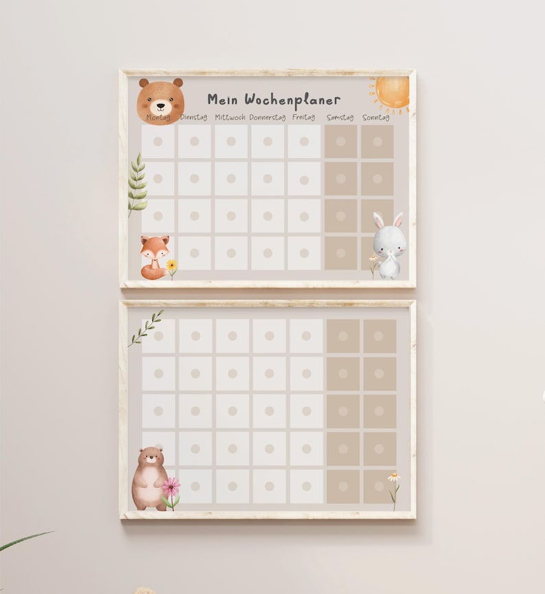 May include: Two framed weekly planners with a beige background and white squares. The top planner features a brown bear, a fox, and a sun. The bottom planner features a brown bear and a flower. The text "Mein Wochenplaner" is at the top of the planner.