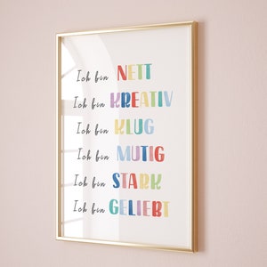 May include: A framed print with the text "Ich bin NETT", "Ich bin KREATIV", "Ich bin KLUG", "Ich bin MUTIG", "Ich bin STARH", and "Ich bin GELIEBT" in colourful letters.