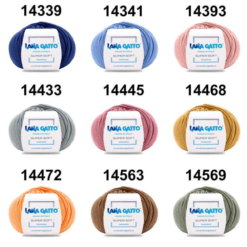 May include: Nine balls of yarn in different colors, including blue, light blue, pink, gray, light pink, yellow, orange, brown, and green. Each ball has a white label with the text "LANA GATTO MADE IN ITALY SUPER SOFT www.lanagatto.it" and a number printed above the label.