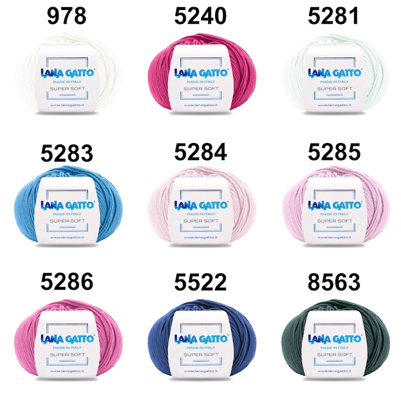 May include: Nine skeins of yarn in various colors, including white, pink, light blue, dark blue, and green. Each skein has a label that reads "Lana Gatto Made in Italy Super Soft" and a website address.