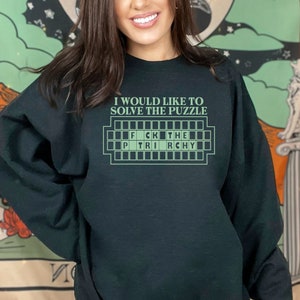 I would like to solve the puzzle, Fuck the Patriarchy, wheel of fortune, svg, png. Funny Taylor swift design for shirts, vinyl decals, magnets, stickers. Patriarchy. Patriarchy svg. Fuck the patriarchy. All too well. Red album. Taylor Swift.