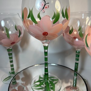 Vintage Handpainted Pink floral and butterfly wine glasses long stemmed wine glassware 8.5” T 4” W  holds 16oz Beautiful!!!