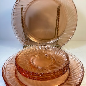 Vintage Arcoroc Rosalind Pink Swirl  12 Pieces  (4) plates 9” (4) Lunch/ Salad plates 7 3/4” and (4) Saucers 5” excellent condition