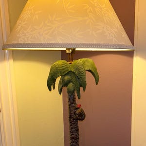 Vintage Palm Tree Red Cap Monkey Lamp  29” T Base to Finial, 6” base. Bamboo Print Shade  9.5”” x 17”Preowned Table Lamp Perfect