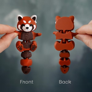 May include: An articulated red panda fidget toy, displayed from the front and back. The front view shows a detailed face with white accents, while the back view shows the segmented design. The text "Front" and "Back" are visible.