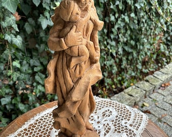 Sculpture titled Mother Madonna with child