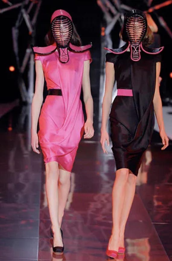 alexander mcqueen hot pink dress Alexander - A floating butterfly dress in flamingo pink with a voluminous  billowing train. See more: http://bit.ly/MCQUEENAW18SHOW