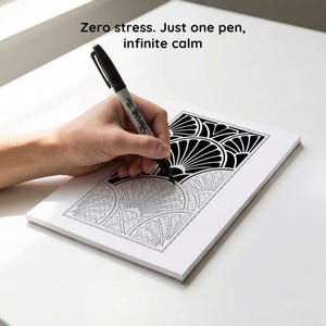 May include: A black Sharpie pen is used to colour a black and white geometric design on a white notepad. The text "Zero stress. Just one pen, infinite calm" is visible. The image suggests a relaxing activity.