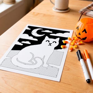 May include: A black and white coloring page featuring a cat sitting on a dotted surface against a night sky with a crescent moon and clouds. The illustration is printed on white paper with clean, bold outlines, providing a clear graphic design.