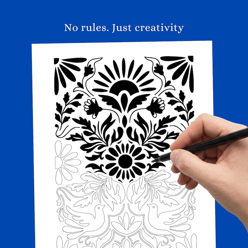 May include: Black and white floral design on white paper. The image includes the text "No rules. Just creativity". A hand is holding a black pen, in the process of colouring the design.