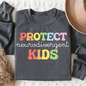 a gray shirt that says protect nerdainwergent kids