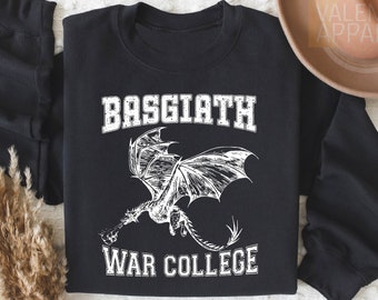 May include: Black sweatshirt with a white graphic of a dragon and the text "Basgiath War College".