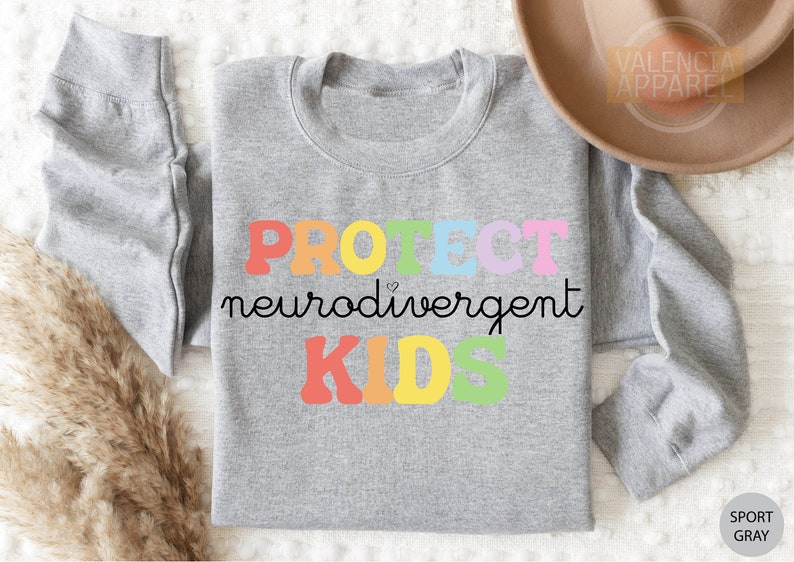 a gray shirt with the words project neuroavement kids on it