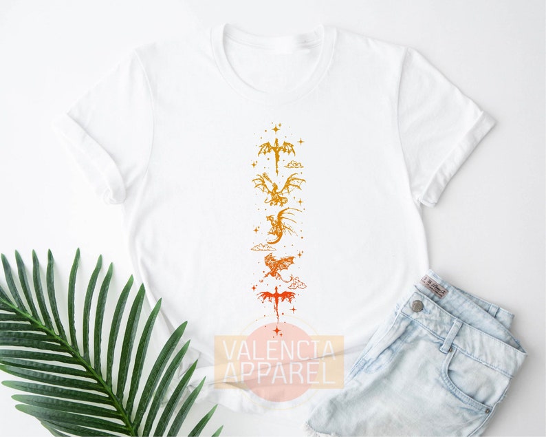 a t - shirt with a picture of a dragon on it