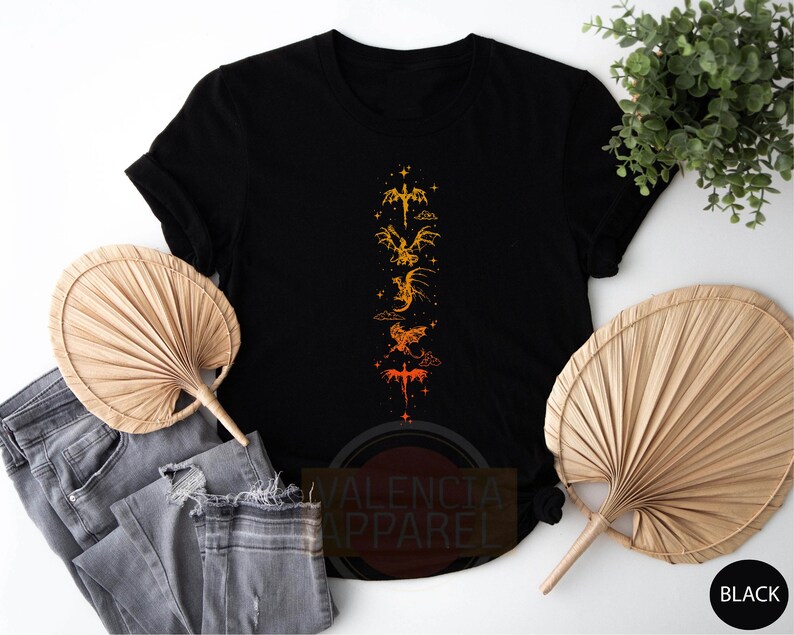 a black t - shirt with a picture of a dragon on it