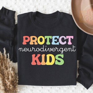 a black shirt with the words protect nerdweavement kids on it