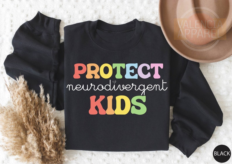a black shirt with the words protect nerdweavement kids on it