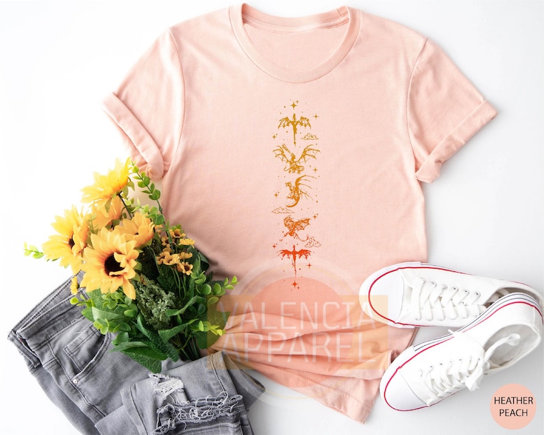 a t - shirt with a flower and a pair of jeans