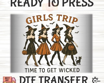 May include: A DTF transfer design featuring four women dressed as witches, each holding a pumpkin and wearing a black hat. The text reads "GIRLS TRIP TIME TO GET WICKED". A black cat is also present. The words "READY TO PRESS" and "DTF TRANSFER" are also visible.