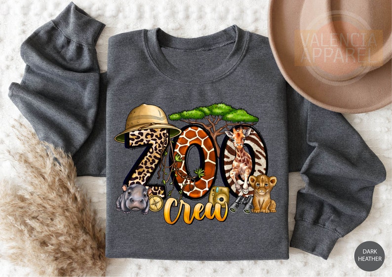 a gray shirt with a picture of animals and the words zoo crew on it
