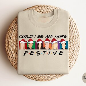 a t - shirt that says could i be more festive?
