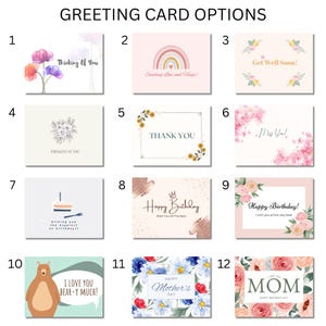 May include: A collection of twelve rectangular greeting cards labeled 1 through 12. Designs include floral illustrations, a rainbow, a bear, and birthday cakes with text such as Thinking of You, Thank You, Happy Birthday, and I Love You Bear-y Much.