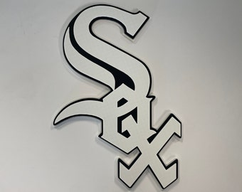 May include: A white, stylised 'S' and 'X' logo with black outlines. The 'S' is a large, bold letter with a curved top and bottom. The 'X' is smaller and sits below the 'S'.