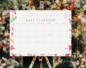 Op de afbeelding: Een roze en witte kalender met harten en een regenboog hart. De kalender heeft de titel "raad het aankomstdatum van BABY CLARKSON".
