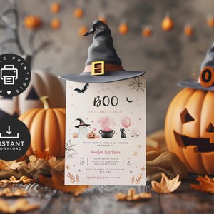 May include: A rectangular baby shower invitation card featuring the text A LITTLE BOO IS ALMOST DUE, decorated with illustrations of a ghost in a witch hat, a black cauldron, a black cat, and pumpkins, topped with a black witch hat graphic.