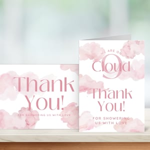 May include: Two pink and white thank you cards with watercolour clouds and the text "We are on cloud 9" and "Thank You!" with the words "For showering us with love" at the bottom.