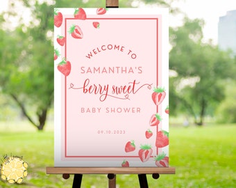 Könnte beinhalten: Ein rosafarbenes und rotes Willkommens-Schild mit dem Text "Willkommen zu Samantha's Berry Sweet Baby Shower 09.10.2023". Das Schild ist mit Aquarell-Illustrationen von Erdbeeren verziert.