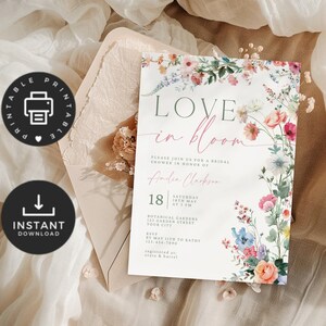 May include: A bridal shower invitation with floral accents. The invitation features the words "Love in Bloom" in a delicate script, with additional text and floral illustrations. The design includes a printable and instant download option.