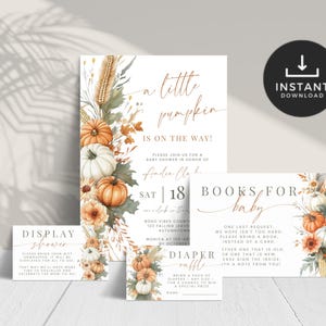 May include: A set of white baby shower stationery featuring watercolor illustrations of orange and white pumpkins, dried wheat, and autumn leaves. The cards include text such as A little pumpkin is on the way, Books for baby, Display shower, and Diaper raffle.