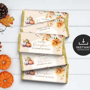 May include: Chocolate bar wrappers with a fall theme. The wrappers feature watercolor pumpkins, floral accents, and the text "A Little Pumpkin is Joining the Patch!" and "Thank You for Joining Us".