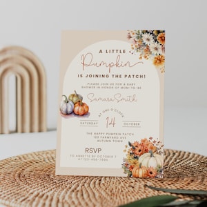 May include: A baby shower invitation with a watercolour design. The invitation features the text "A Little Pumpkin is Joining the Patch!" and includes details for a baby shower, with pumpkins and floral accents. The invitation is on a beige background.