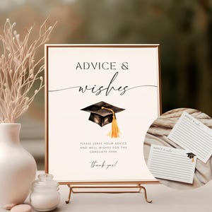 May include: A white ceramic mug with a black handle and the text "But First, Coffee" in a bold, black font. The mug is filled with a dark liquid, likely coffee, and sits on a light-colored surface.