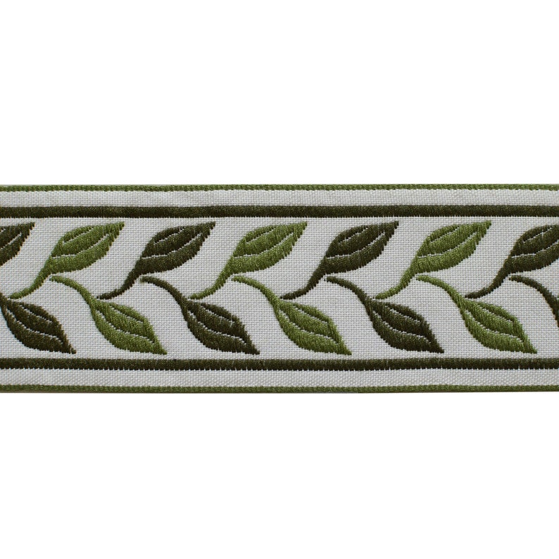 May include: A decorative trim featuring a repeating pattern of green leaves on a white background. The leaves are in varying shades of green, with a darker green border. The trim is suitable for various craft and sewing projects.
