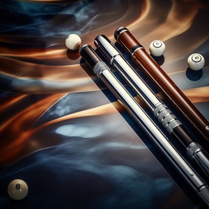 May include: Three pool cues, two silver and one brown, lay on a blue and brown marbled surface with white billiard balls scattered around them.