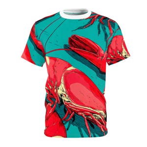 May include: A white crew neck t-shirt featuring a vibrant red lobster design against a teal background. The graphic art style includes bold lines and shading, creating a striking visual effect. The shirt's design is repeated across the fabric.