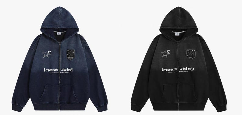 May include: Two zip-up hoodies, one in a dark blue denim wash and the other in black. Each features a hood, front pockets, and a white graphic that reads "Inestublcs" with a star and shield emblem. The number "17" is also visible.