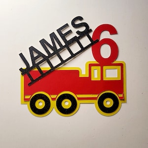 Fire engine themed personalised cake topper