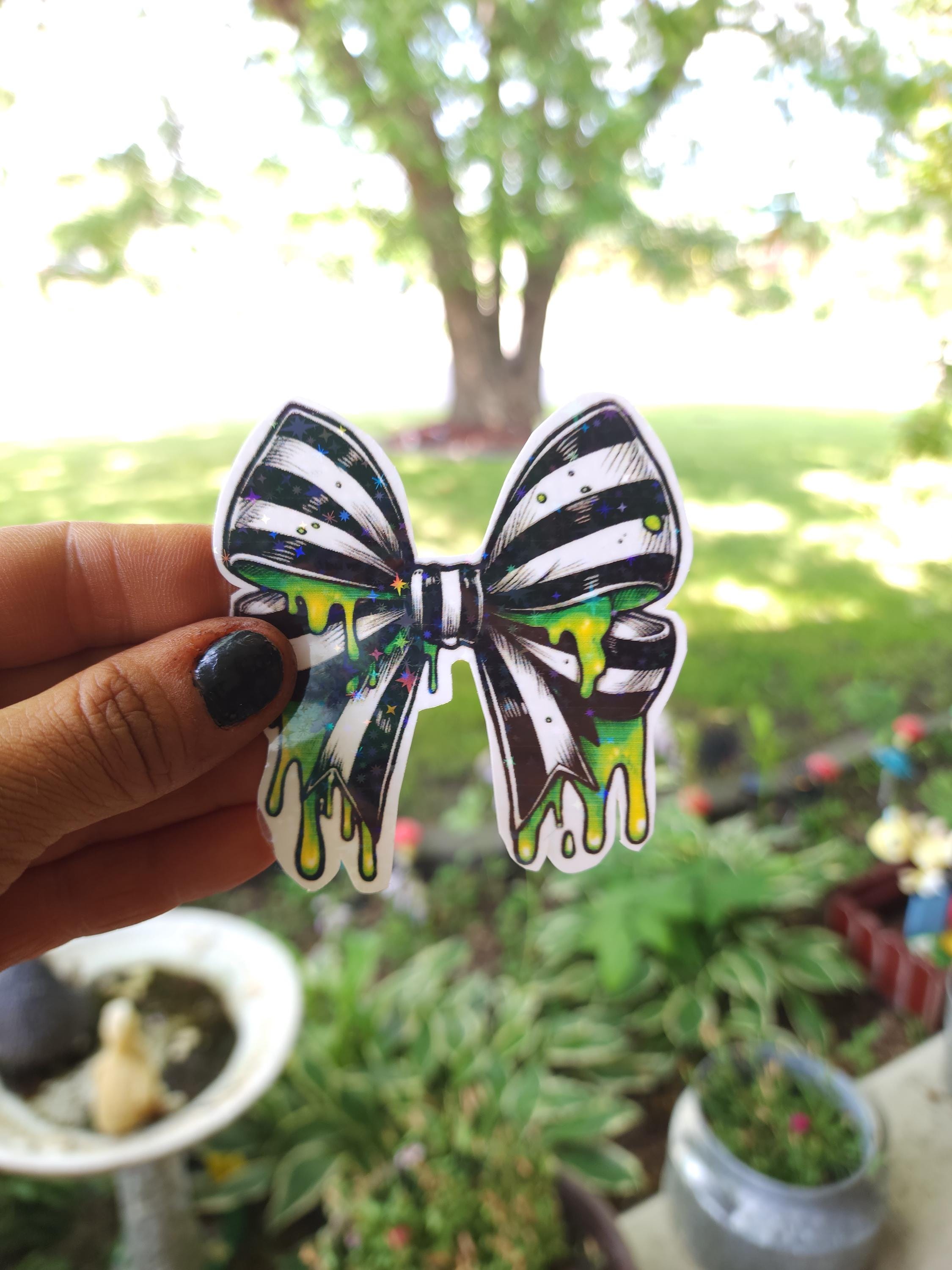 Gothic Bow Vinyl Sticker: Black & White Stripes with Neon Green Slime - Thumbnail 3