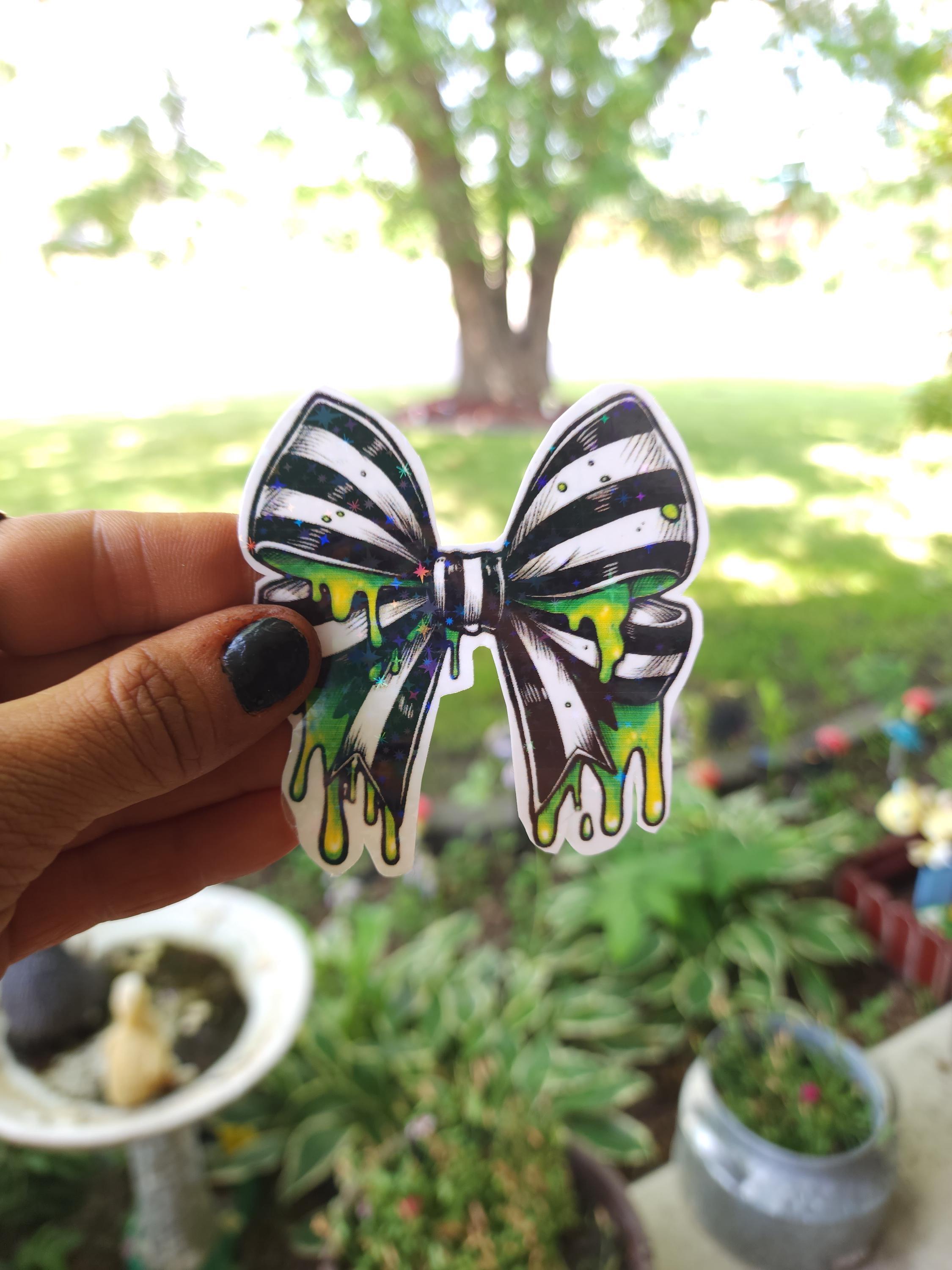 Gothic Bow Vinyl Sticker: Black & White Stripes with Neon Green Slime - Thumbnail 5