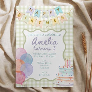 May include: A birthday invitation with a green gingham background. The invitation features the text "HAPPY BIRTHDAY" on a banner, along with the name "Amelia" and the age "3". A watercolor cake and balloons are also depicted.